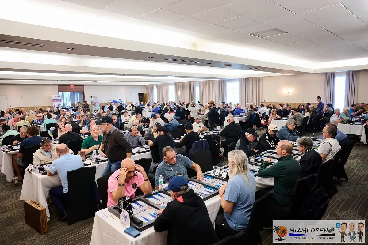 A tournament hall full of backgammon boards